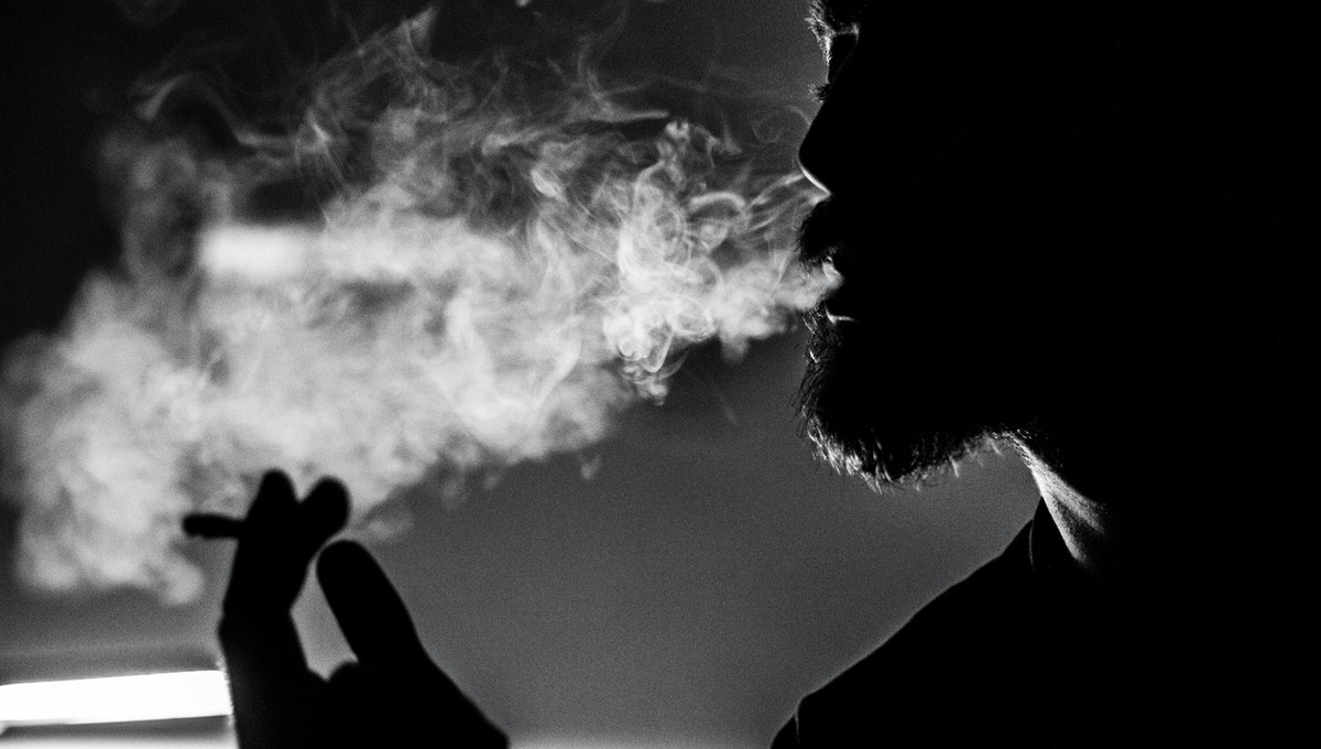 Image of a man smoking bidi